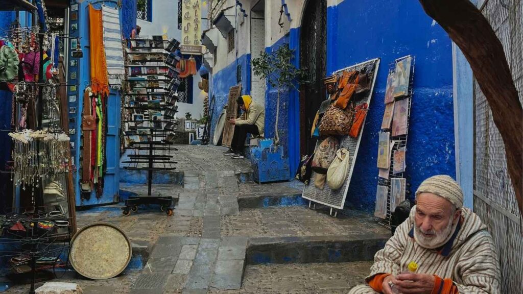 Handmade crafts displayed in a blue street of medina