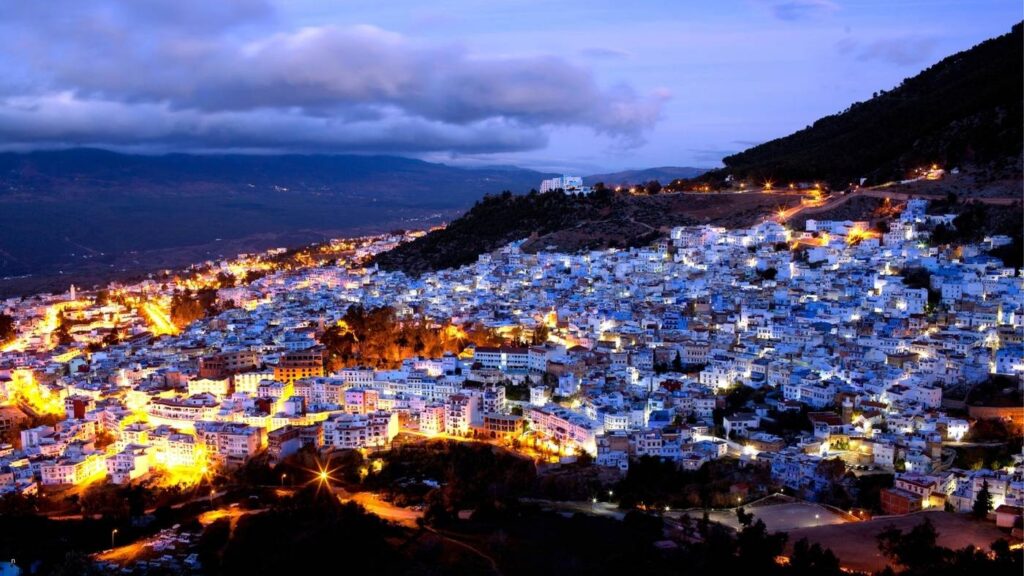 The blue city illuminated at dusk in the Rif Mountains