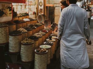 Moroccan souk with colorful stalls and daily life