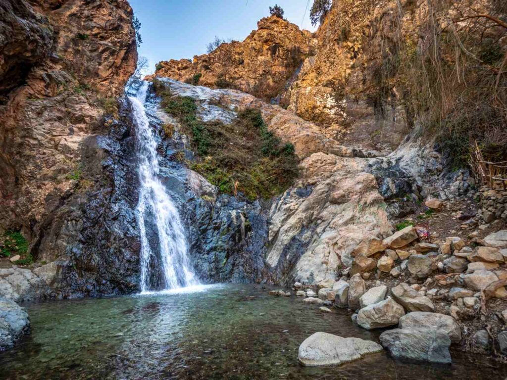 Small waterfall surrounded by rocks in the Ourika Valley