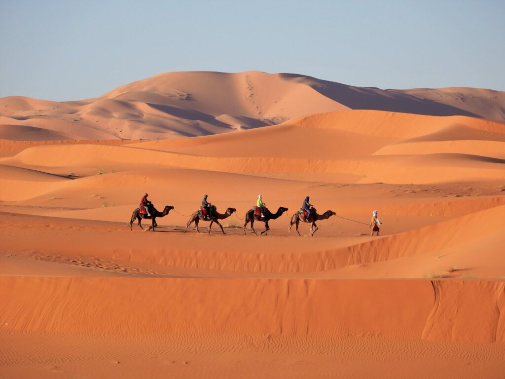 Sahara Desert tour in Morocco with camel trek across sand dunes