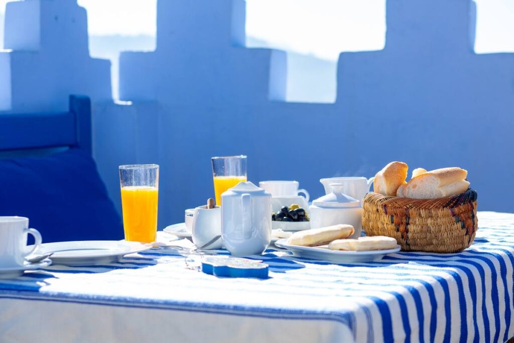Traditional Moroccan breakfast with fresh bread and mint tea